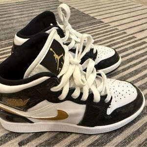 Air Jordan Black and White Sneakers with Gold Accents size 3.5